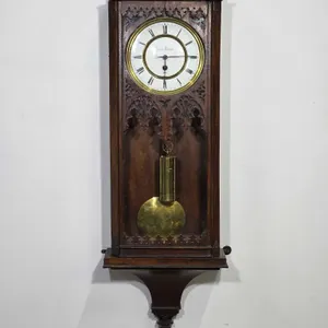 Kilian Krause Gothic Style Wall Clock. Has Key. Does not have a chime. It is missing a stabilizer foot on the left side, the hour hand is loose and cr