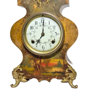 New Haven Brass Mantel Clock with Hand Painted Scenery. Winds, ticks and has a clear chime. No key. 9 x 5 x 13. A2