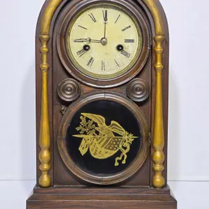 Antique E. Ingraham Eight Day Mantel Clock. 9.5 x 4.5 x 16. Winds, Ticks and has a Clear Chime. A2