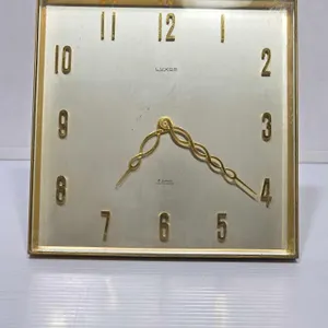 Luxor 8 Day Swiss Made Table Clock. 6 x 6. Winds and Ticks. Has Some scratches on the face, and is a bit dirty under the glass. A2