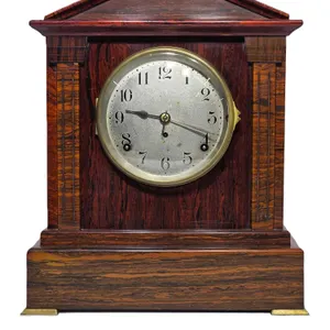 Seth Thomas 4 Bell Mantel Clock. 12 x 7.5 x 14. Winds, ticks and chimes. One Chime is a bit dull. The bezel is a little bent so it does not close prop