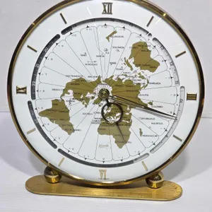 Kundo World Time Zone Clock. Electric. AA Battery Operated. Works. 9.5 x 9.5. A1