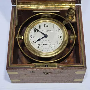 Waltham Ships Clock. Winds up and ticks. . 5 x 5 x 5. Reserve Only $400. A1