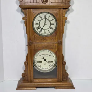 Waterbury Calendar Shelf Clock #40. Winds and ticks. Rings clear on the hour and half hour. 14 x 6 x 24. Reserve only $200. A1
