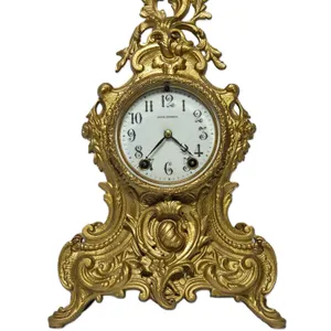 Seth Thomas Rococo Mantel Clock. 9.5 x 4.5 x 16. Winds and tiks and chimes. Missing pendulum. T