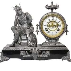 Ansonia Mantel Clock with Roman God Mercury Perched Beside it. The clock winds, ticks and chimes. 17.5 x 7.5 x 15. T