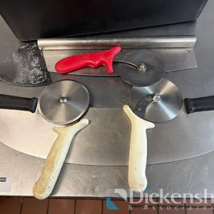 LOT OF PIZZA CUTTERS
