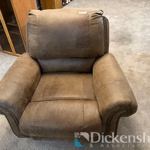 ROCKING BROWN LEATHERETTE RECLINER