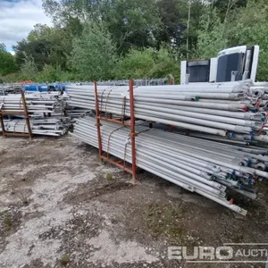 Stillage of Haki Braces (5 of), Stillage of Aluminium Tower Stabilisers (9 of), Bundle of Aluminium Tower Frames (2 of) 
