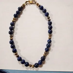 Blue lapis lazuli Necklace, gold tone spacers