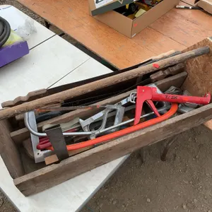 Carpenters toolbox, hand saws, hacksaw, squares, level, etc.