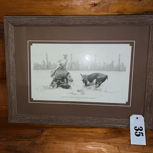 A 13 1/2"x17" 2015 CALGARY STAMPEDED FRAMED PRINT & 25 1/2"x18 1/2" "JESSE JAMES & MATLOCK ROSE NCHA RESERVE WORLD CHAMPION 1951" FRAMED PRINT