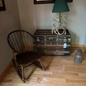 VINTAGE WOODEN ROCKER, BARN LANTERN, VINTAGE CHEST w/ CHRISTMAS DECORATIONS & A DEER ANTLER LAMP