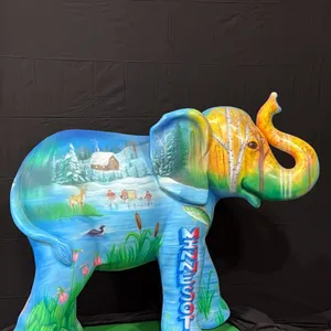 A Minnesota-Themed Painted Elephant Display Sculpture. Custom-painted with a collage of iconic Minnesota imagery: Paul Bunyan, the State Capitol, MN S