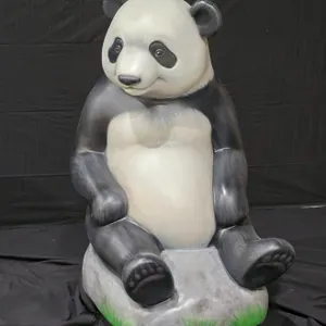 A Sitting Panda Display Sculpture. Seated panda painted like a classic panda. Original Master Sculpture from the PandaMania event presented by the D.C