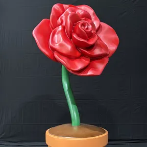 A Rose Display Sculpture. Red rose on a green stem in a terracotta-colored pot. Original Master Sculpture from the Roseville in Bloom event presented 