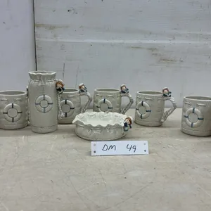 Nautical-Themed Ceramic Mug Set with Sailor Figurines, Vase, and Dish, Nine Pieces