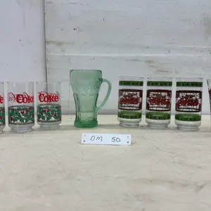 Vintage Coca-Cola Holiday Tumblers, Green Pitcher, and Promotional Glasses