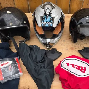 Three Motorcycle Helmets with Accessories