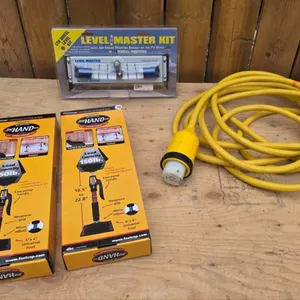 RV Accessories Lot: Level Master Kit, RV Stabilizer Jacks, and Power Cord