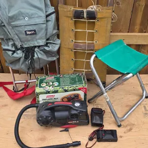 Indian Pack Board, Lightweight Backpack, and Camera with Accessories
