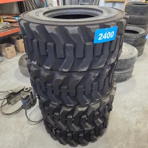 (4) Caterpillar 12-16.5 Skid Steer Tires