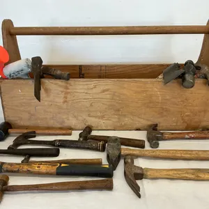 Array of Hammers, Axes, Mallets and a Wooden Toolbox