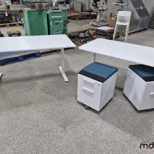 63"x31" Adjustable Height Desk. 63"x31"  Work Table & (2) Rolling Cabinets
 UNRESERVED