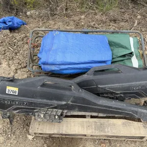 Pallet of Atv Gun Scabbard, Hitch Carrier & Tarps
