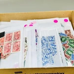 38 packages of Canada & world stamps