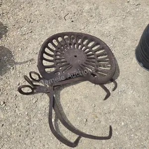 Tractor seat and tongs