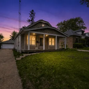 Hardwood Floors, 2 Car Garage & Expansion Potential