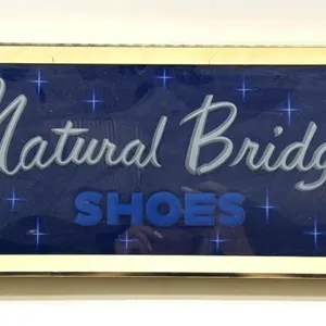 Vintage Natural Bridge Shoes Glass and Metal Sign
