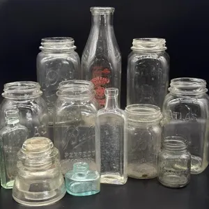 Milk Bottle, Jars, Bottles, and Insulator 9.5”