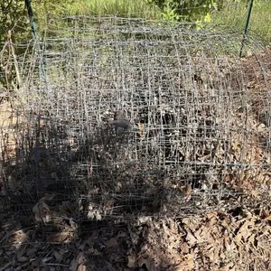 Roll of used fencing wire roughly 36 inches tall