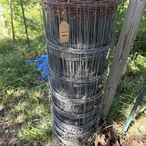 Partial roll of new wire roughly 48 inches tall