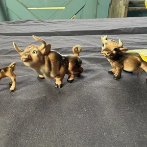 Ceramic cow family