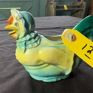 Chicken in a bonnet syrup pitcher