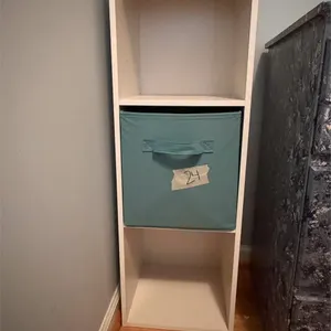 Narrow White and Teal Shelf Unit