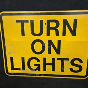 24"�18" TURN ON LIGHTS Highway Sign