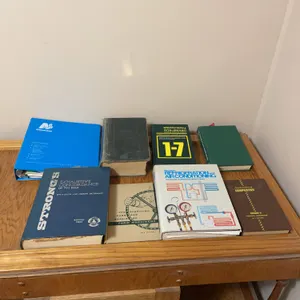 Various informational books, fundamentals of carpentry, modern refrigeration, and air conditioning, electricity, one through seven, steam plant operat