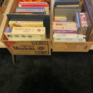 Two boxes of books, miscellaneous Bible song, CDs for children, cassette tapes