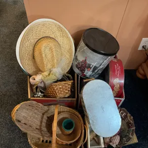 Cookie tins, baskets, straw, hats, and miscellaneous decorative