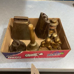 Cowbells, handbells cast Campbell Soup kids figurine