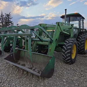 John Deere 3140 MFWD Tractor and John Deere 260 Front End Loader and Grapple