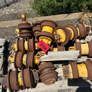 (2) Pallets of Deere 750J Idlers and Rollers