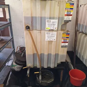 2 Poly Oil Containers on Stand