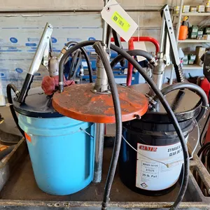 2 Oil Can/Pumps & 1 Pump Top