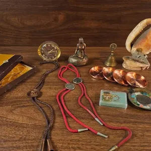 Decorative Items Including Miniature Clock, Figurine, and Shell Lamp
