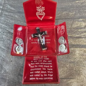 Black and Silver Crucifix with Red Case and Religious Coins